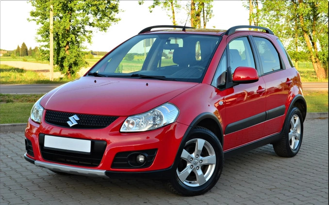 Suzuki SX4 cena 31900 przebieg: 93865, rok produkcji 2013 z Piastów małe 562
